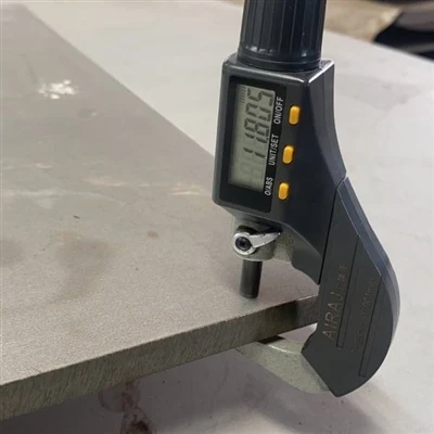 Qu'est-ce que le matériau ASTM B409 ?